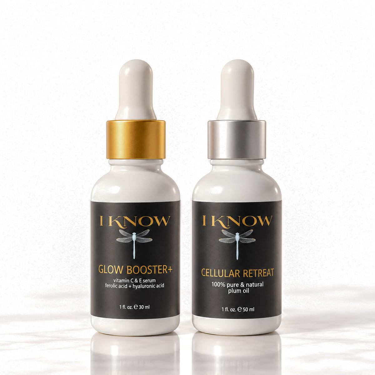 Two skincare dropper bottles from IKnow Cosmetics on a white marble surface against a white background. The left bottle is &