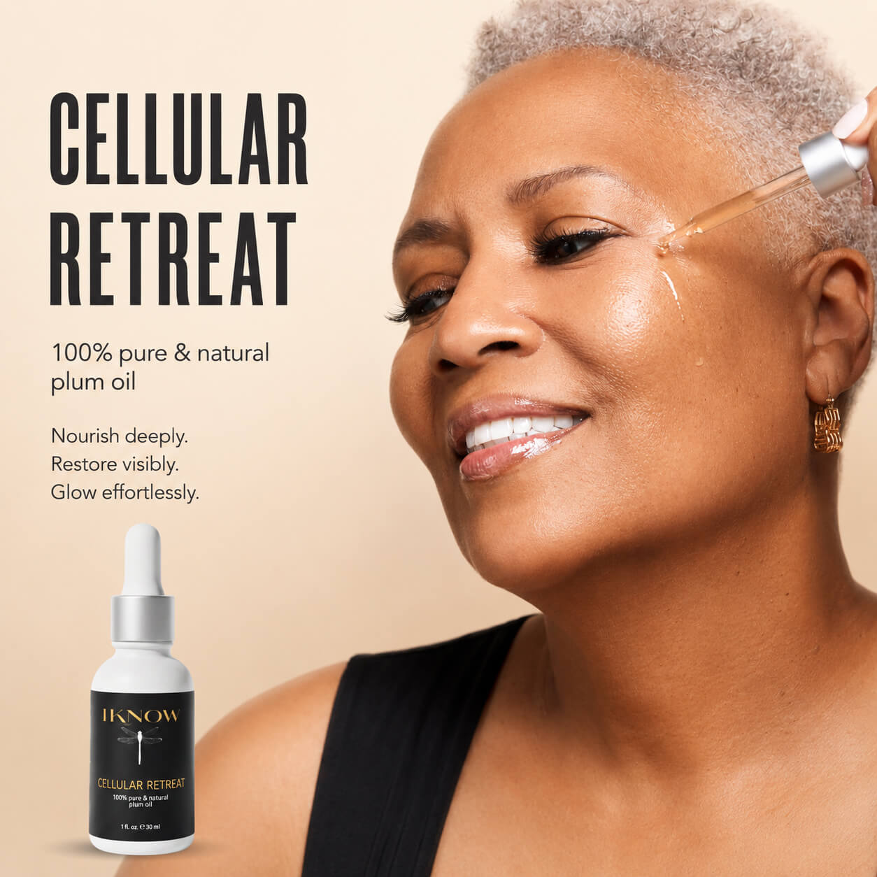 Woman of color applying facial oil to support a nourished, radiant complexion