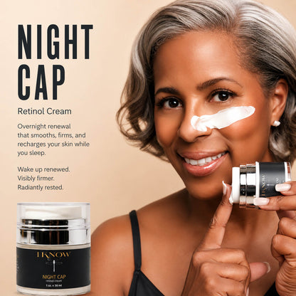 Woman applying Night Cap Retinol Cream to her face with product packaging displayed.