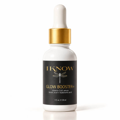 A white dropper bottle of IKnow Glow Booster+ serum with a gold collar and a black label, set against a clean white background.